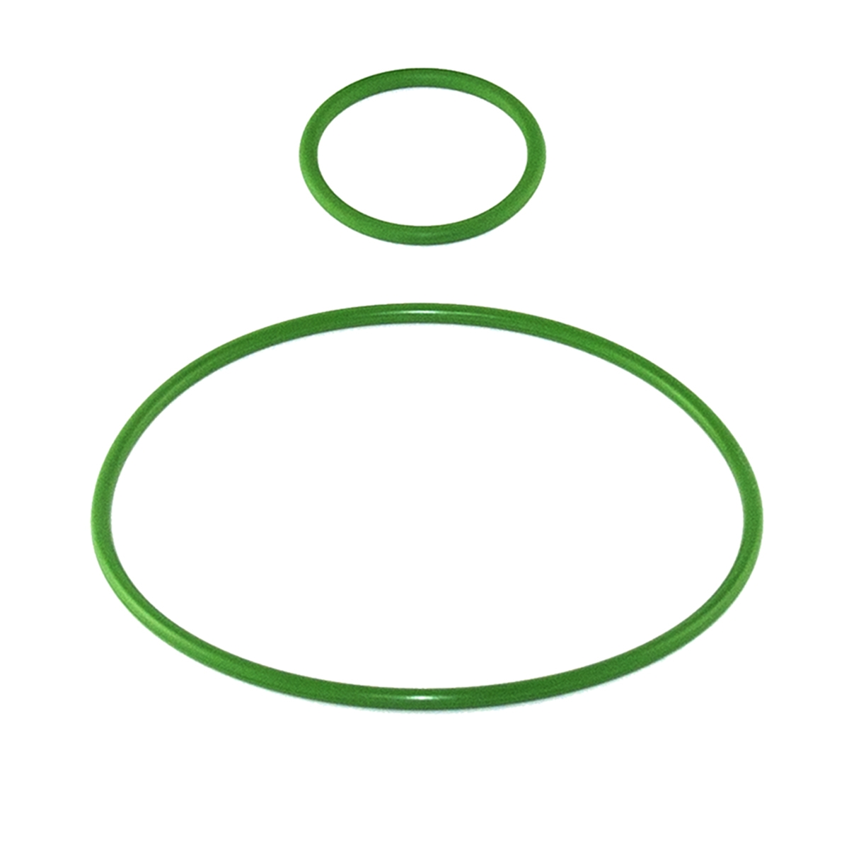 Two green O-rings laid out stock image